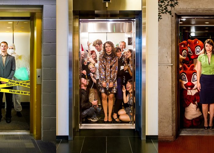Three photos of open elevators next to each other. In the first elevator are two actors in hazmat suits with one actor in front in a suit; there is "do not cross" tape across the entrance. In the second elevator, there is a person in a brown dress facing out with a party of celebrating people behind. In the third elevator there is a person in the center facing out in a black skirt and green top. Behind and around them there are 5 actors in squirrel mascot outfits.