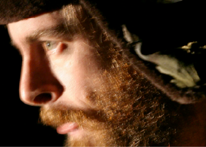 a closeup of a bearded actor