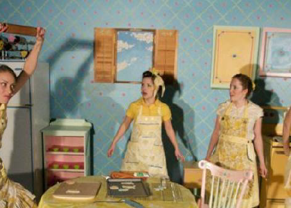four actors in a kitchen
