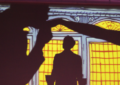 projection of dancers in a cartoon ballroom