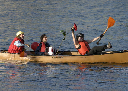three actors in a canoe