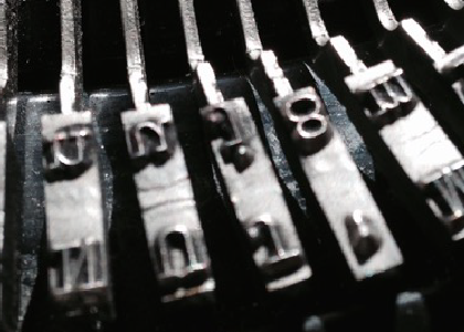 closeup of typewriter stamp keys