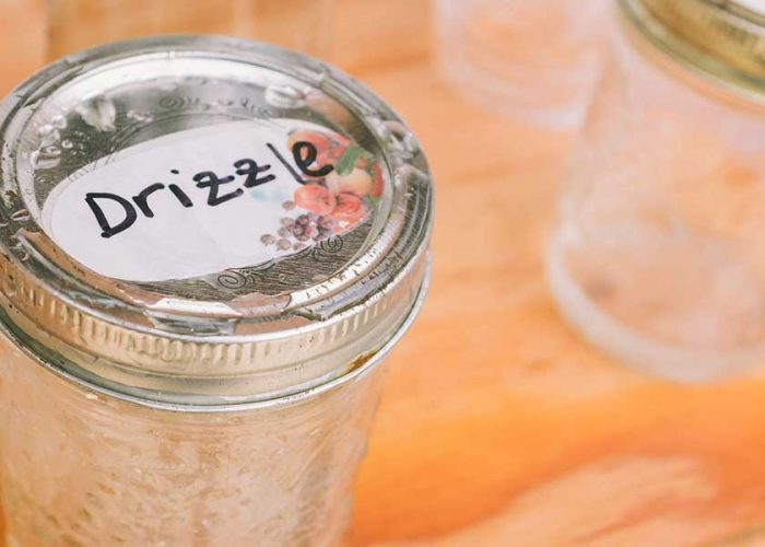 mason jar with drizzle written on the top